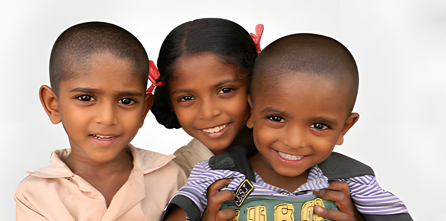 Smiling children cared for by the foundation